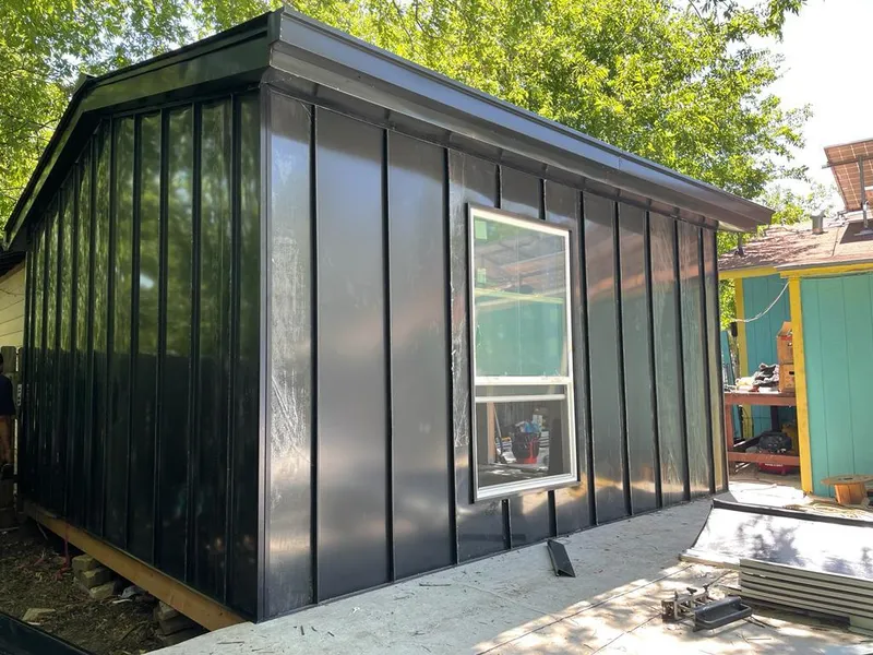 Black standing seam metal wall panels for Metal Roof Installation in DeLand